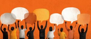Diverse group of people with raised arms, holding speech bubbles